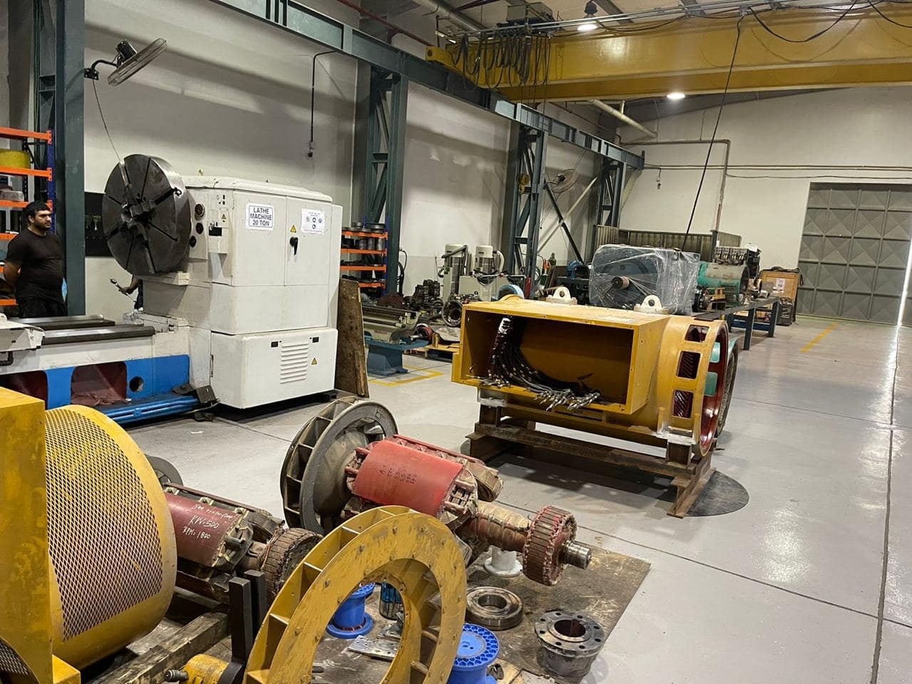 Large motors on the workshop floor awaiting field return